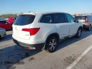 2017 Honda Pilot EX-L with VIN 5FNYF6H54HB015814, listed as a IAAI auction lot 41955743 with 122,389 mi miles and . Bid and sale history available at DreamBid. Image 4.