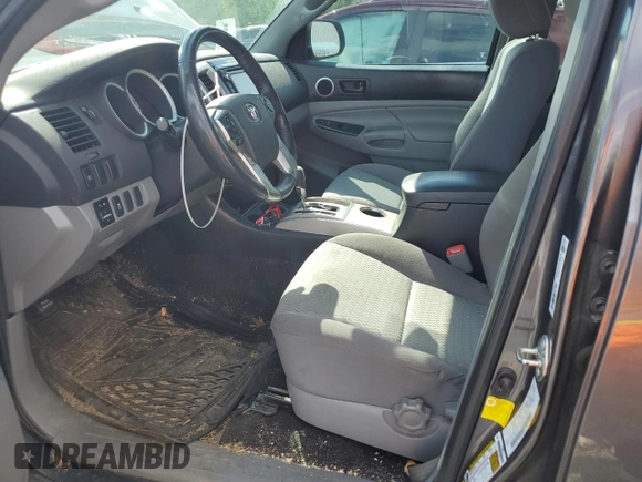 2014 Toyota Tacoma PreRunner z VIN 5TFJU4GN2EX054013, wystawiony jako Copart lot #56953795 z przebiegiem 183 484 mil mil oraz Szkoda całkowita • Salvage title. Historia ofert i sprzedaży dostępna na DreamBid. Obrazek 7.