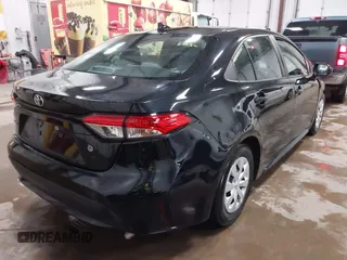 2021 Toyota Corolla L with VIN 5YFDPMAE5MP208692, listed as a IAAI auction lot 41472857 with 63,736 mi miles and . Bid and sale history available at DreamBid. Image 4.