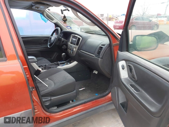 2006 Mazda Tribute i with VIN 4F2YZ02Z96KM08546, listed as a IAAI auction lot 41554299 with Not Provided miles and . Bid and sale history available at carsss.com. Image 5.