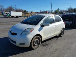2010 Toyota Yaris with VIN JTDKT4K39A5289561, listed as a IAAI auction lot 41860064 with 176,642 mi miles. Bid and sale history available at carsss.com. Image 2.
