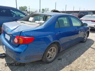 2009 Toyota Corolla with VIN JTDBL40E799044489, listed as a IAAI auction lot 42053660 with 186,356 mi miles. Bid and sale history available at carsss.com. Image 4.