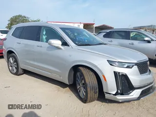2020 Cadillac XT6 FWD Premium Luxury z VIN 1GYKPCRSXLZ136057, wystawiony jako IAAI lot #42211514 z przebiegiem 32 476 mil mil oraz . Historia ofert i sprzedaży dostępna na DreamBid. Obrazek 1.