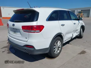 2016 Kia Sorento LX z VIN 5XYPGDA50GG141084, wystawiony jako IAAI lot #41848617 z przebiegiem 102 576 mil mil oraz . Historia ofert i sprzedaży dostępna na DreamBid. Obrazek 4.