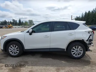 2015 Mazda CX-5 Touring with VIN JM3KE4CY4F0488484, listed as a IAAI auction lot 42115093 with 156,344 mi miles. Bid and sale history available at carsss.com. Image 15.