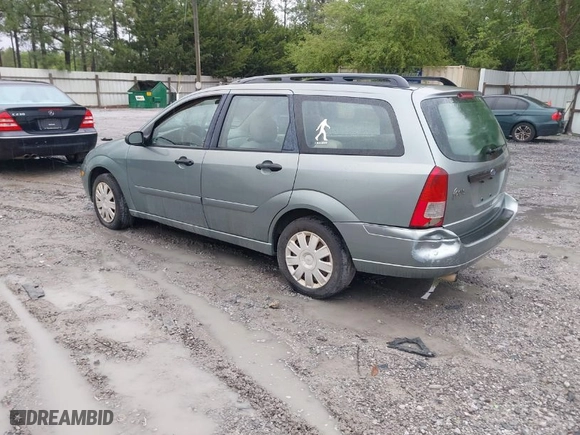 2004 Ford Focus SE with VIN 1FAFP36Z34W152554, listed as a IAAI auction lot 41964947 with 214,886 mi miles. Bid and sale history available at carsss.com. Image 3.