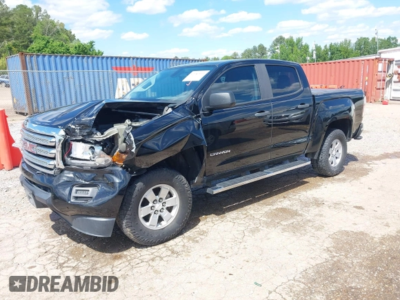 2018 GMC Canyon 2WD z VIN 1GTG5BEN9J1137949, wystawiony jako IAAI lot #42189911 z przebiegiem 98 296 mil mil oraz . Historia ofert i sprzedaży dostępna na DreamBid. Obrazek 2.
