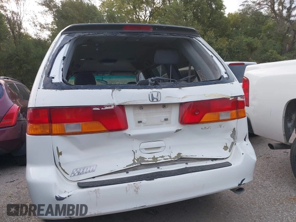 2004 Honda Odyssey EX-L with VIN 5FNRL18074B109717, listed as a IAAI auction lot 37731273 with 314,449 mi miles and . Bid and sale history available at DreamBid. Image 6.