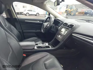 2018 Ford Fusion Titanium with VIN 3FA6P0D99JR139114, listed as a IAAI auction lot 41991248 with 142,324 mi miles. Bid and sale history available at carsss.com. Image 5.