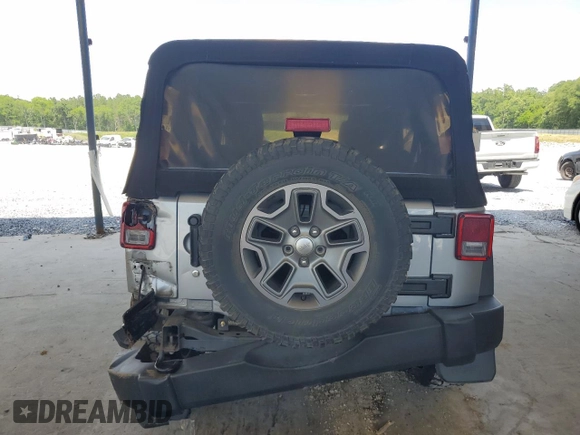 2017 Jeep Wrangler Unlimited Rubicon with VIN 1C4BJWFG4HL677477, listed as a Copart auction lot 57758175 with 89,584 mi miles and Salvage title. Bid and sale history available at DreamBid. Image 6.