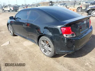 2013 Scion tC with VIN JTKJF5C74D3063012, listed as a IAAI auction lot 41776592 with 142,071 mi miles. Bid and sale history available at carsss.com. Image 3.