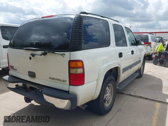2003 Chevrolet Tahoe LS with VIN 1GNEC13V73R260171, listed as a IAAI auction lot 42582419 with 270,072 mi miles and . Bid and sale history available at DreamBid. Image 4.