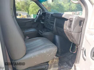 2014 Chevrolet Express Cargo Van with VIN 1GCWGFCG0E1100859, listed as a IAAI auction lot 42142748 with 182,900 mi miles. Bid and sale history available at carsss.com. Image 5.
