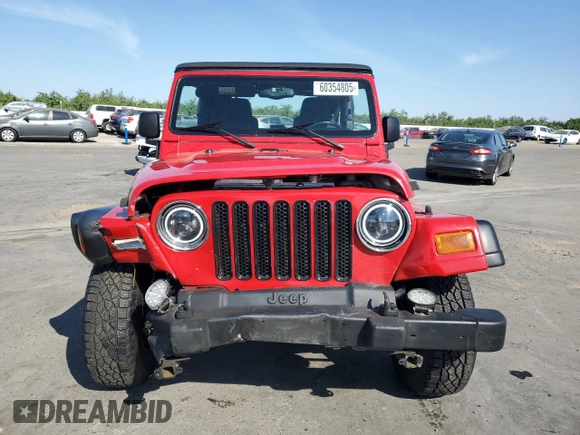2003 Jeep Wrangler Sport z VIN 1J4FA49S33P302780, wystawiony jako Copart lot #60354805 z przebiegiem 201 679 mil mil oraz Szkoda całkowita • Salvage title. Historia ofert i sprzedaży dostępna na DreamBid. Obrazek 5.