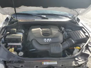 2013 Jeep Grand Cherokee Overland with VIN 1C4RJECG8DC526150, listed as a Copart auction lot 52038775 with 183,813 mi miles and Salvage Title. Bid and sale history available at DreamBid. Image 13.