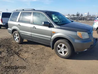 2007 Honda Pilot EX-L with VIN 5FNYF28797B001772, listed as a IAAI auction lot 41320270 with 220,227 mi miles. Bid and sale history available at carsss.com. Image 1.