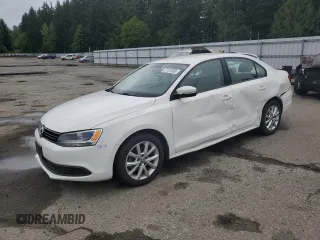 2012 Volkswagen Jetta SE z VIN 3VWDP7AJ5CM301293, wystawiony jako Copart lot #57131005 z przebiegiem 93 898 mil mil oraz Szkody całkowita. Historia ofert i sprzedaży dostępna na DreamBid. Obrazek 1.
