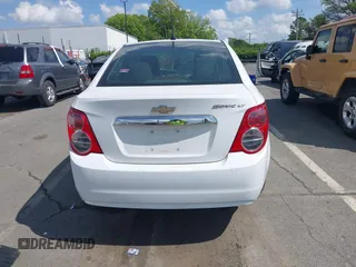 2014 Chevrolet Sonic LT with VIN 1G1JC5SH0E4232070, listed as a IAAI auction lot 41970353 with 140,557 mi miles and . Bid and sale history available at DreamBid. Image 16.