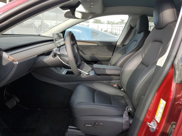 2024 Tesla Model Y Long Range with VIN 7SAYGAEE8RF081789, listed as a Copart auction lot 87361764 with 11,690 mi miles and Salvage Title. Bid and sale history available at carsss.com. Image 7.