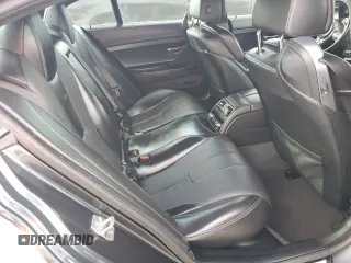 2015 BMW M6 z VIN WBS6C9C58FD467819, wystawiony jako Copart lot #70903944 z przebiegiem 85 596 mil mil oraz Szkoda całkowita • Salvage title. Historia ofert i sprzedaży dostępna na DreamBid. Obrazek 10.
