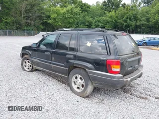 1999 Jeep Grand Cherokee Laredo with VIN 1J4GW58S0XC524798, listed as a IAAI auction lot 42761040 with 173,792 mi miles and . Bid and sale history available at DreamBid. Image 3.