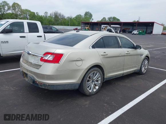 2011 Ford Taurus Limited with VIN 1FAHP2FW3BG131025, listed as a IAAI auction lot 42039938 with 99,138 mi miles and . Bid and sale history available at carsss.com. Image 4.