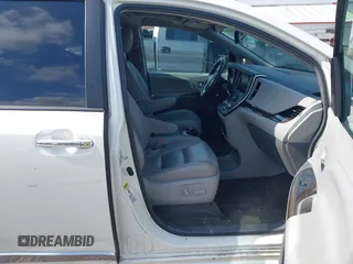 2016 Toyota Sienna XLE with VIN 5TDYK3DC4GS748888, listed as a IAAI auction lot 42605968 with 164,811 mi miles and . Bid and sale history available at DreamBid. Image 5.