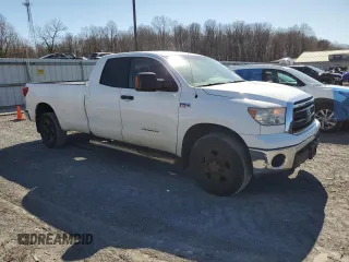 2012 Toyota Tundra 4WD Truck with VIN 5TFCY5F16CX013253, listed as a Copart auction lot 49734105 with 301,345 mi miles and Clean Title. Bid and sale history available at carsss.com. Image 4.