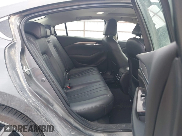 2020 Mazda 6 Grand Touring with VIN JM1GL1TY6L1525169, listed as a IAAI auction lot 41683512 with 73,313 mi miles and . Bid and sale history available at DreamBid. Image 8.