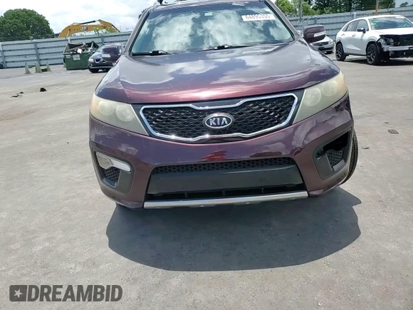 2012 Kia Sorento SX with VIN 5XYKW4A29CG308152, listed as a Copart auction lot 64895355 with 126,816 mi miles and Salvage title. Bid and sale history available at DreamBid. Image 14.