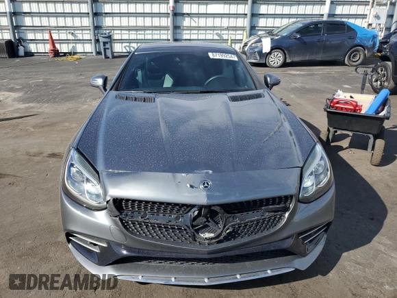 2020 Mercedes-Benz SLC 300 с VIN W1KPK3JAXLF170648, выставлен на аукционе Copart как лот 87199254 с пробегом Не указан миль и Списание • Salvage title. История ставок и продаж доступна на DreamBid. Изображение 5.