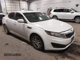 2011 Kia Optima LX with VIN KNAGM4A7XB5121112, listed as a IAAI auction lot 41384717 with 140,821 mi miles and . Bid and sale history available at carsss.com. Image 1.