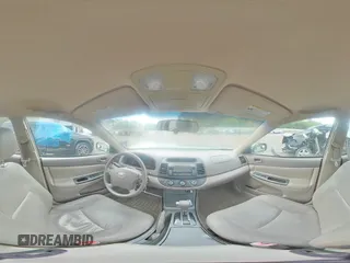 2006 Toyota Camry LE z VIN 4T1BF32K06U621520, wystawiony jako Copart lot #54069555 z przebiegiem 195 499 mil mil oraz Szkoda całkowita • Salvage title. Historia ofert i sprzedaży dostępna na DreamBid. Obrazek 14.