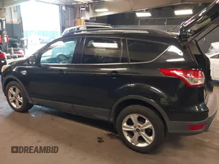2014 Ford Escape SE with VIN 1FMCU0GX6EUE31877, listed as a IAAI auction lot 42080730 with 71,251 mi miles. Bid and sale history available at carsss.com. Image 3.