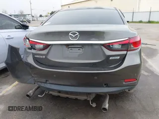 2016 Mazda 6 i Touring with VIN JM1GJ1V52G1473330, listed as a IAAI auction lot 41657684 with 138,064 mi miles and . Bid and sale history available at DreamBid. Image 16.