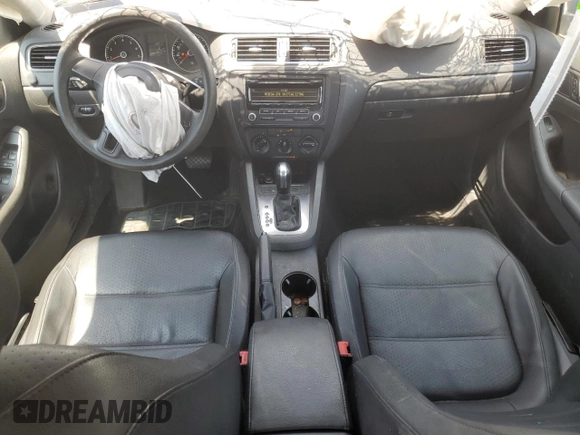 2014 Volkswagen Jetta SE with VIN 3VWD17AJ2EM360824, listed as a Copart auction lot 61420075 with 142,101 mi miles and Salvage title. Bid and sale history available at DreamBid. Image 8.