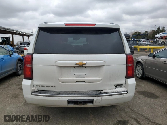 2017 Chevrolet Suburban Premier with VIN 1GNSKJKC6HR305372, listed as a Copart auction lot 47477705 with 141,324 mi miles and Salvage Title. Bid and sale history available at DreamBid. Image 6.