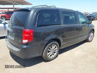 2014 Dodge Grand Caravan SXT with VIN 2C4RDGCG7ER265931, listed as a IAAI auction lot 42141644 with 205,968 mi miles and . Bid and sale history available at DreamBid. Image 4.