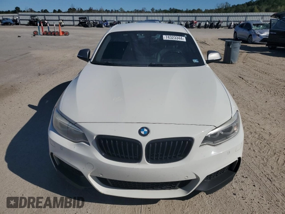 2016 BMW 2 Series M235i xDrive with VIN WBA1J9C50GV371750, listed as a Copart auction lot 74323344 with 92,512 mi miles and Clean Title. Bid and sale history available at carsss.com. Image 5.