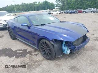 2016 Ford Mustang V6 z VIN 1FA6P8AM5G5271029, wystawiony jako IAAI lot #42277315 z przebiegiem 39 496 mil mil oraz . Historia ofert i sprzedaży dostępna na DreamBid. Obrazek 1.