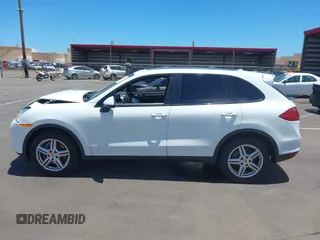 2014 Porsche Cayenne with VIN WP1AA2A22ELA97168, listed as a IAAI auction lot 42315149 with 99,183 mi miles and . Bid and sale history available at DreamBid. Image 15.
