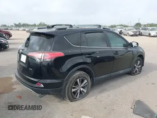 2017 Toyota RAV4 XLE with VIN 2T3WFREVXHW352608, listed as a IAAI auction lot 41921190 with 157,608 mi miles. Bid and sale history available at carsss.com. Image 4.