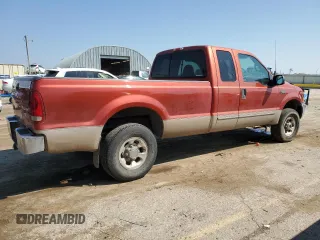 1999 Ford F-250 XL with VIN 1FTNX21SXXEE40026, listed as a Copart auction lot 69888634 with 215,535 mi miles and Salvage title. Bid and sale history available at DreamBid. Image 3.