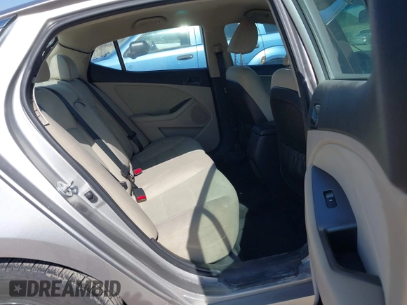 2015 Kia Optima LX with VIN 5XXGM4A78FG477630, listed as a IAAI auction lot 41771874 with 107,065 mi miles and . Bid and sale history available at DreamBid. Image 8.