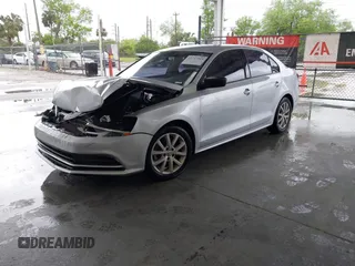 2016 Volkswagen Jetta Sedan 1.4T SE with VIN 3VWD67AJ2GM252658, listed as a IAAI auction lot 41757319 with 147,483 mi miles. Bid and sale history available at carsss.com. Image 17.