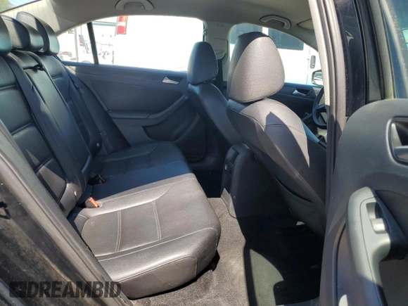 2014 Volkswagen Jetta SE z VIN 3VWD17AJ8EM424820, wystawiony jako Copart lot #63942515 z przebiegiem 180 530 mil mil oraz Czysty tytuł • Clean title. Historia ofert i sprzedaży dostępna na DreamBid. Obrazek 10.