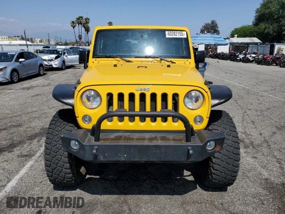 2015 Jeep Wrangler Rubicon Hard Rock with VIN 1C4BJWCG6FL568665, listed as a Copart auction lot 60282155 with 107,773 mi miles and Salvage title. Bid and sale history available at DreamBid. Image 5.