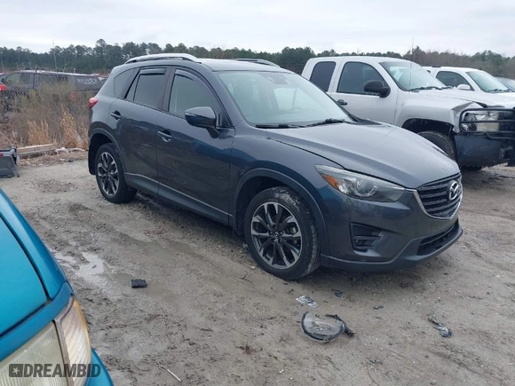 2016 Mazda CX-5 Grand Touring with VIN JM3KE4DY8G0796290, listed as a IAAI auction lot 41619977 with NaN miles. Bid and sale history available at carsss.com. Image 1.