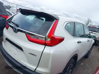 2018 Honda CR-V LX z VIN 2HKRW6H37JH215564, wystawiony jako IAAI lot #42191977 z przebiegiem 90 994 mil mil oraz . Historia ofert i sprzedaży dostępna na DreamBid. Obrazek 4.