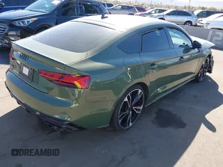 2023 Audi S5 Sportback Premium Plus z VIN WAUB4CF56PA007375, wystawiony jako IAAI lot #41630832 z przebiegiem 23 668 mil mil oraz . Historia ofert i sprzedaży dostępna na DreamBid. Obrazek 4.